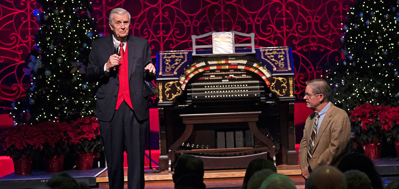 Don Siekmann, producer, manager and master of ceremonies for the Wurlitzer concerts, announces his retirement as Theatre Organ expert Ron Wehmeier looks on.