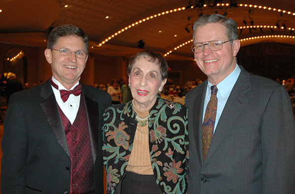 Organist Ron Rhode, President Norma Petersen, and Ron Wehmeier, expert who restored the Wurlitzer