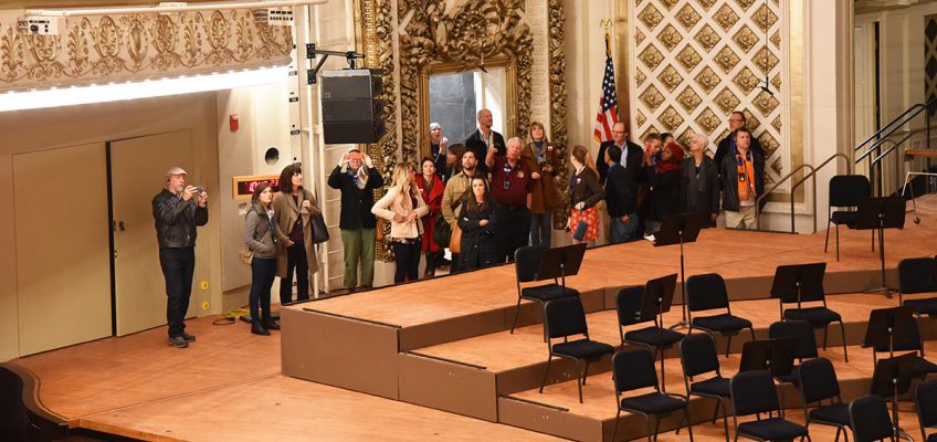 Tour Group on Music Hall's stage