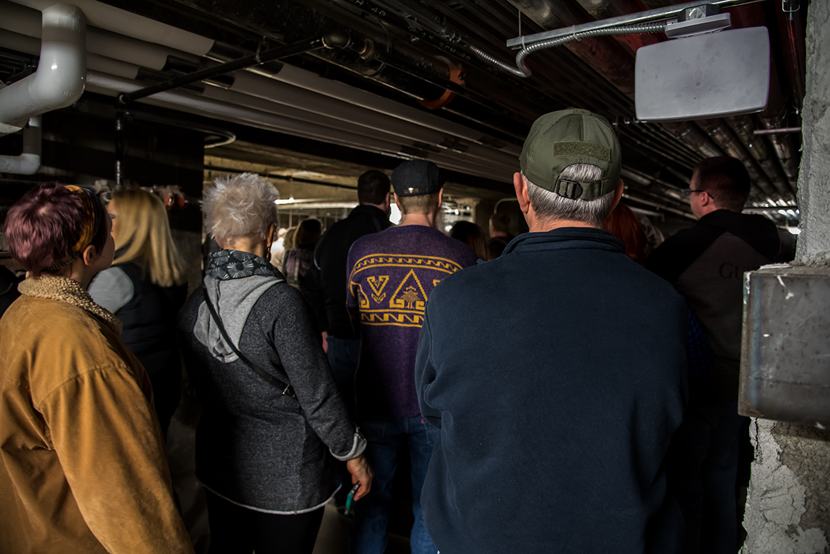 Ghost Tour group in the basement of Music Hall