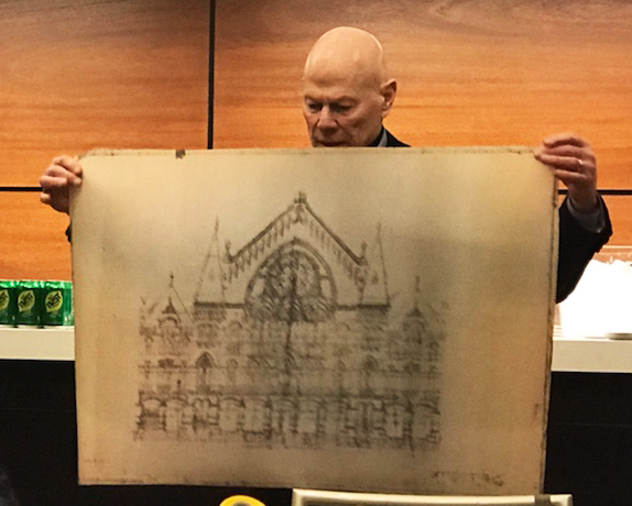 Jim Tarbell holding an architectural rendering of Music Hall
