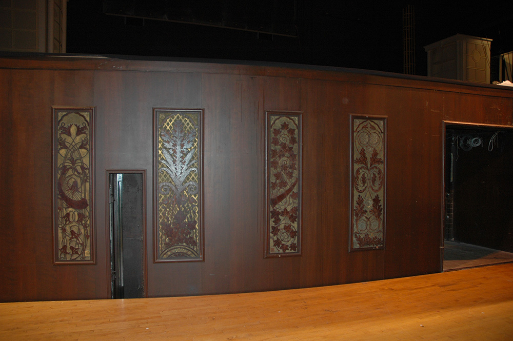 Hand-carved organ panels were hanging in the orchestra pit