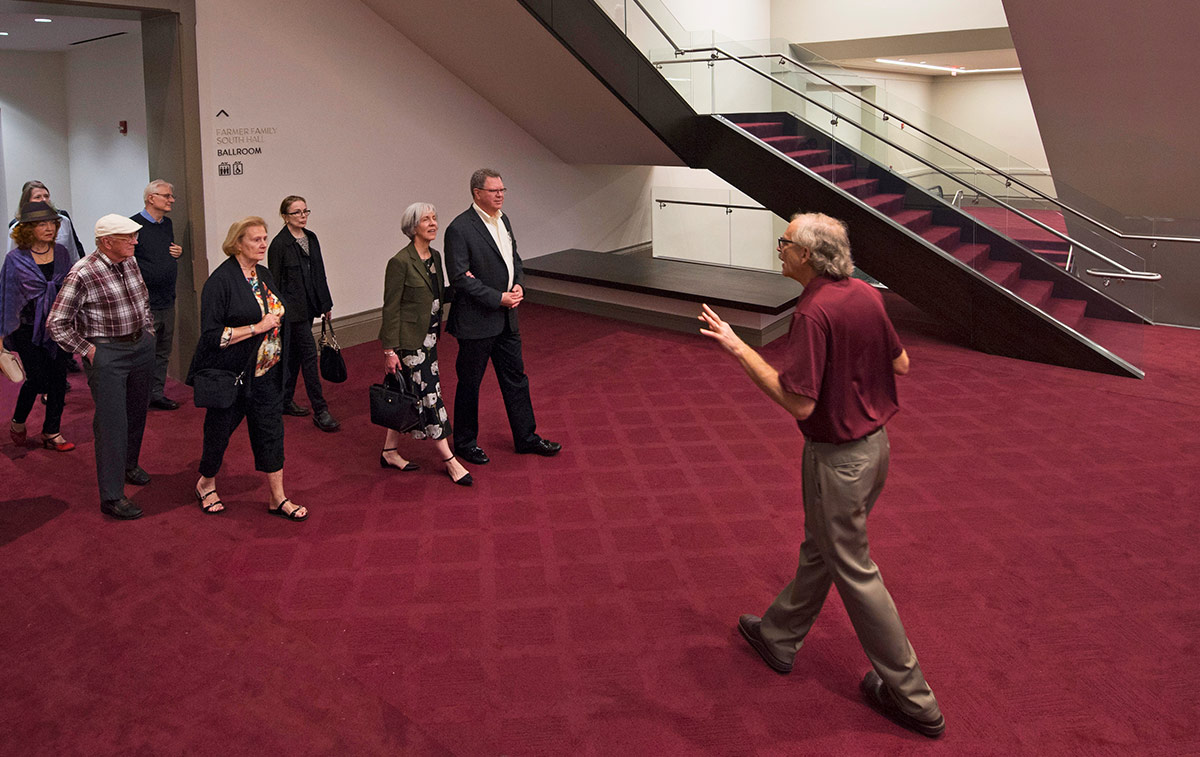 Fred Warren leads a tour group