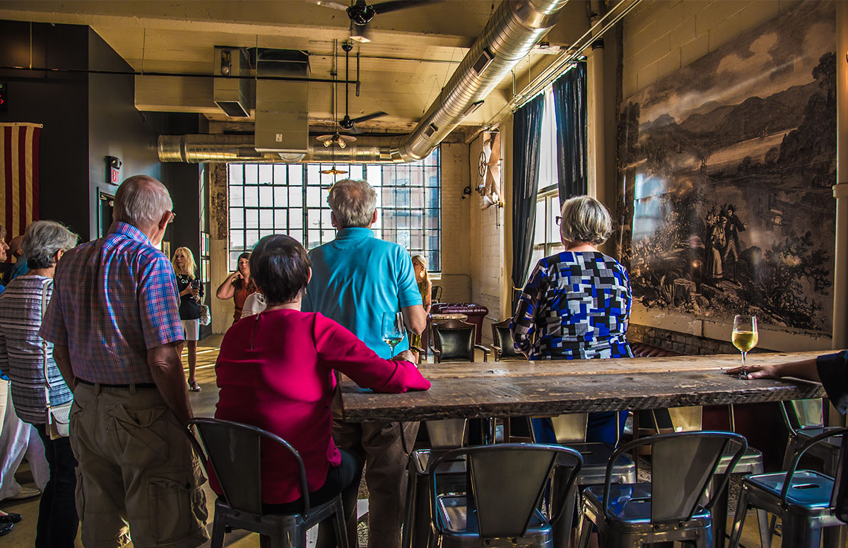 Volunteers in the front room of The Skeleton Root.