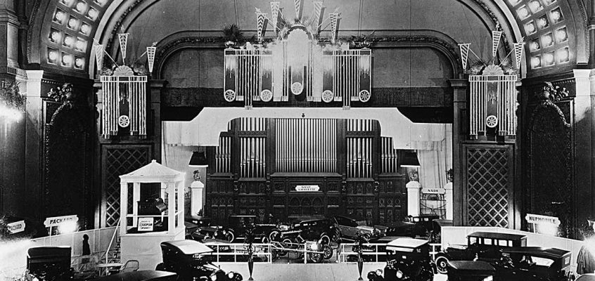 Auto Expo circa 1920s Cincinnati Music Hall shows Autos on floor over seats in Springer Auditorium