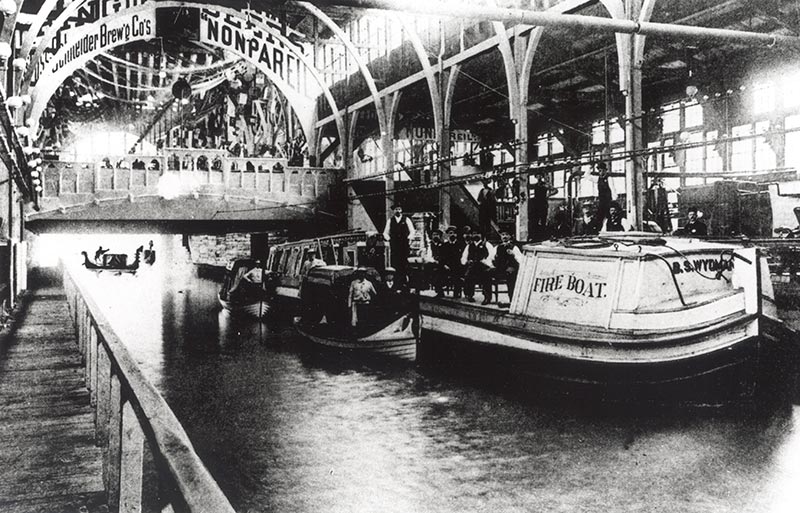 Gondolas traversed the canal carrying visitors under Machinery Hall