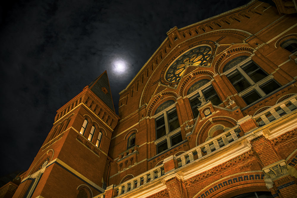 Full moon over Music Hall on the night of a ghost tour