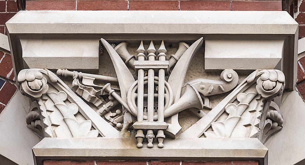 Musical Iinstruments Sandstone Carving on front of the Center Music Hall Building