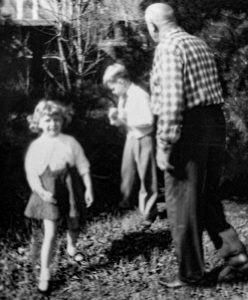 Becky Moeggenberg with her grandfather, John J. Behle, 1954