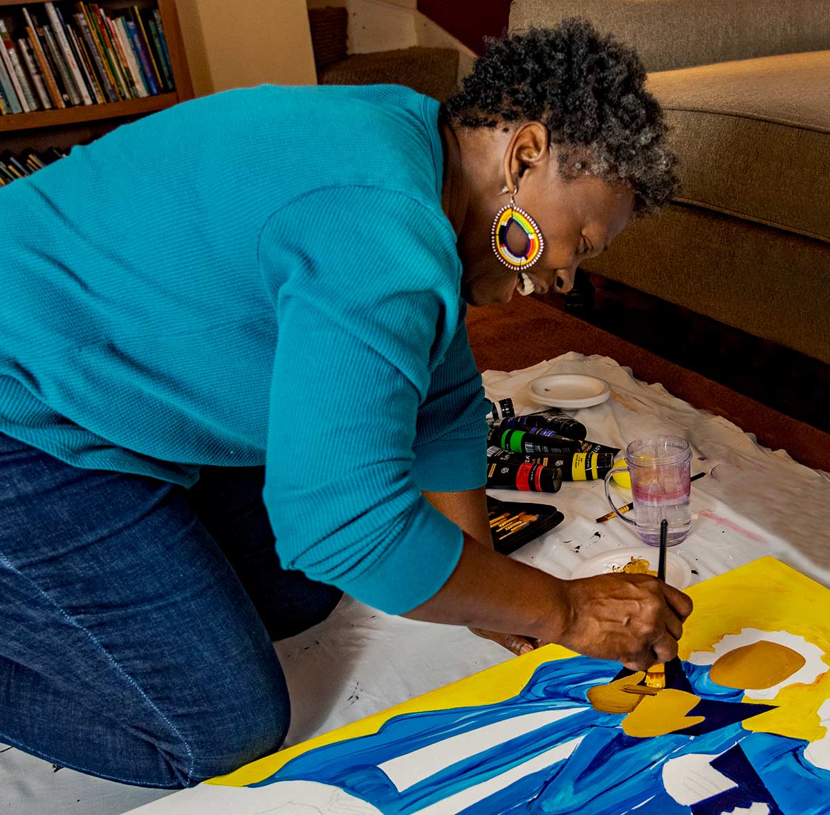 Artist Annie Ruth working in Cincinnati, OH on "Sisters of Legacies"