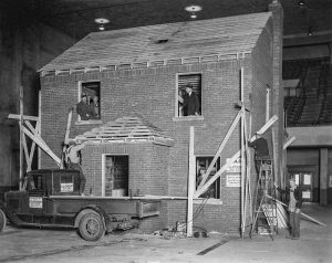 The 1932 Home Beautiful model home being built inside Music Hall. 