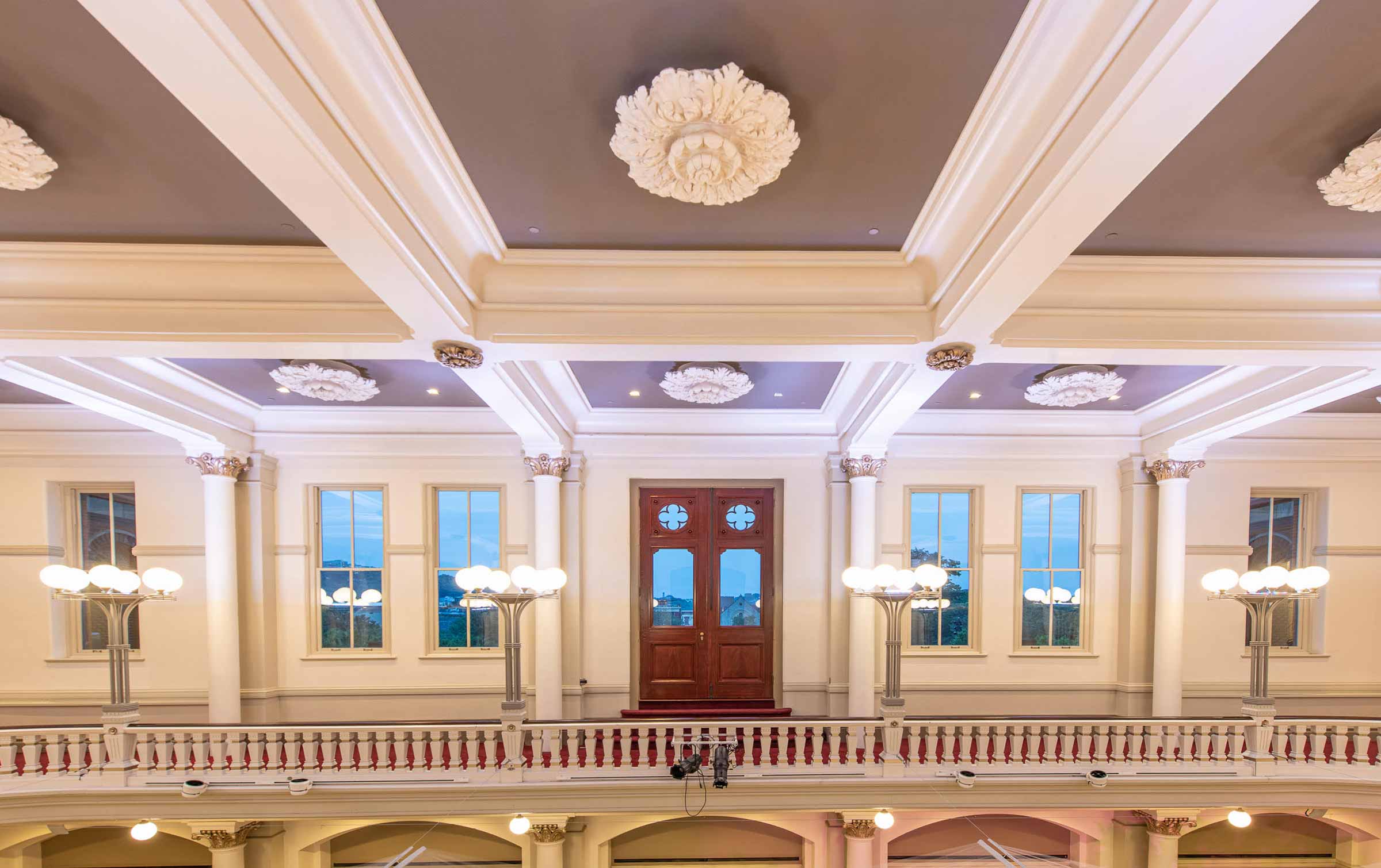 Interior "well" with restored balcony doors. Photo by J. Miles Wolf Photography.