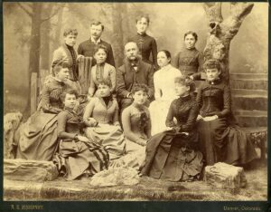 Professor Preston Powers, center, Women Students in Sculpture Class at School of Fine Arts, Denver University, Courtesy Special Collections and Archives, University of Denver.