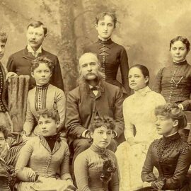 Featured image showing Professor Preston Powers, center, Women Students in Sculpture Class at School of Fine Arts, Denver University, Courtesy Special Collections and Archives, University of Denver.