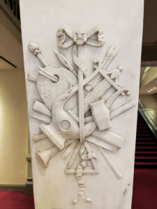 Newel Post Symbolic Bas Relief.